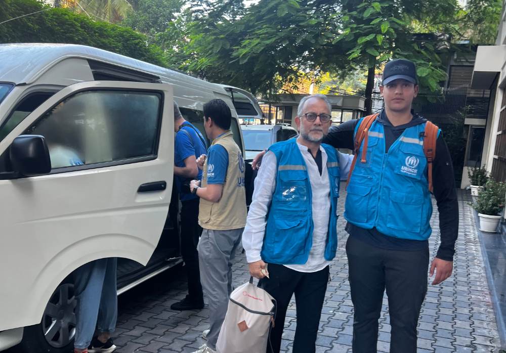 Foundation representative with UNHCR field team
